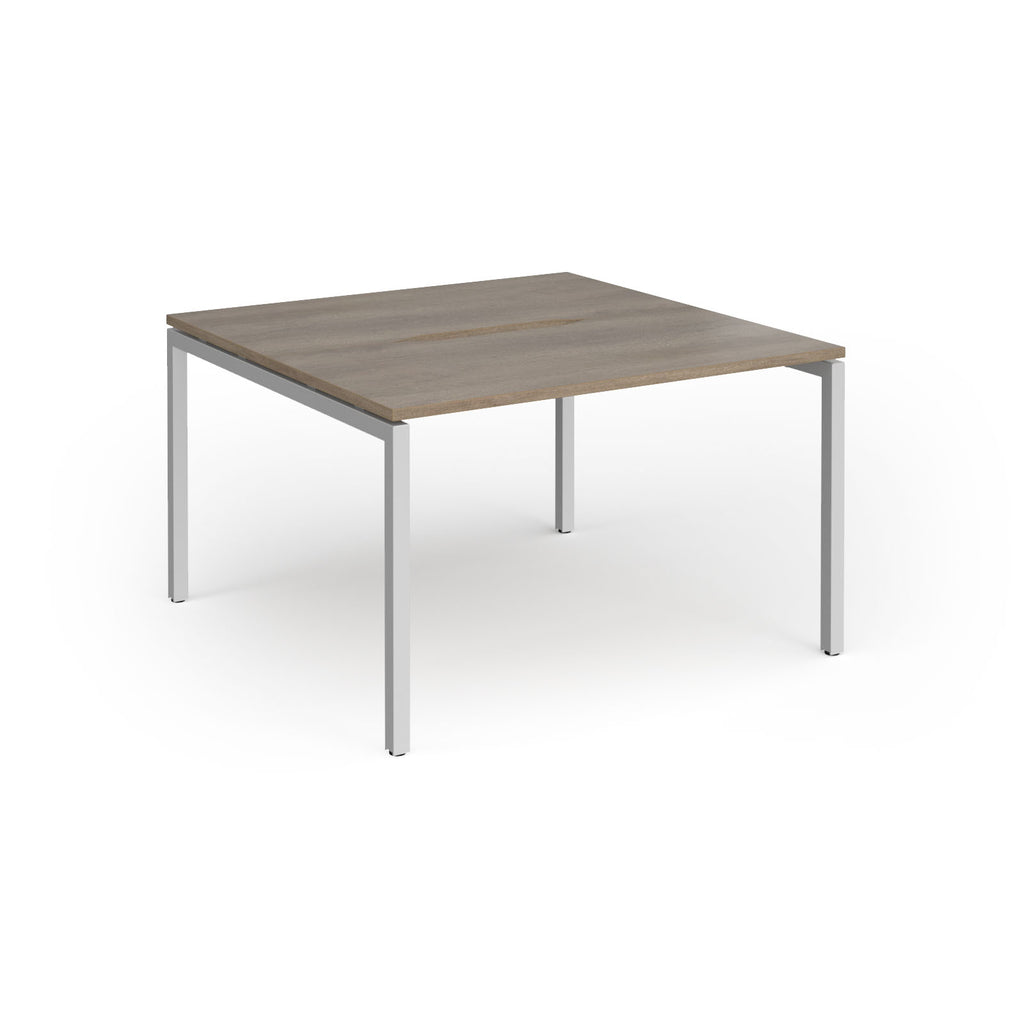 Back-to-back desk with wood-effect top and silver metal frame on a white background