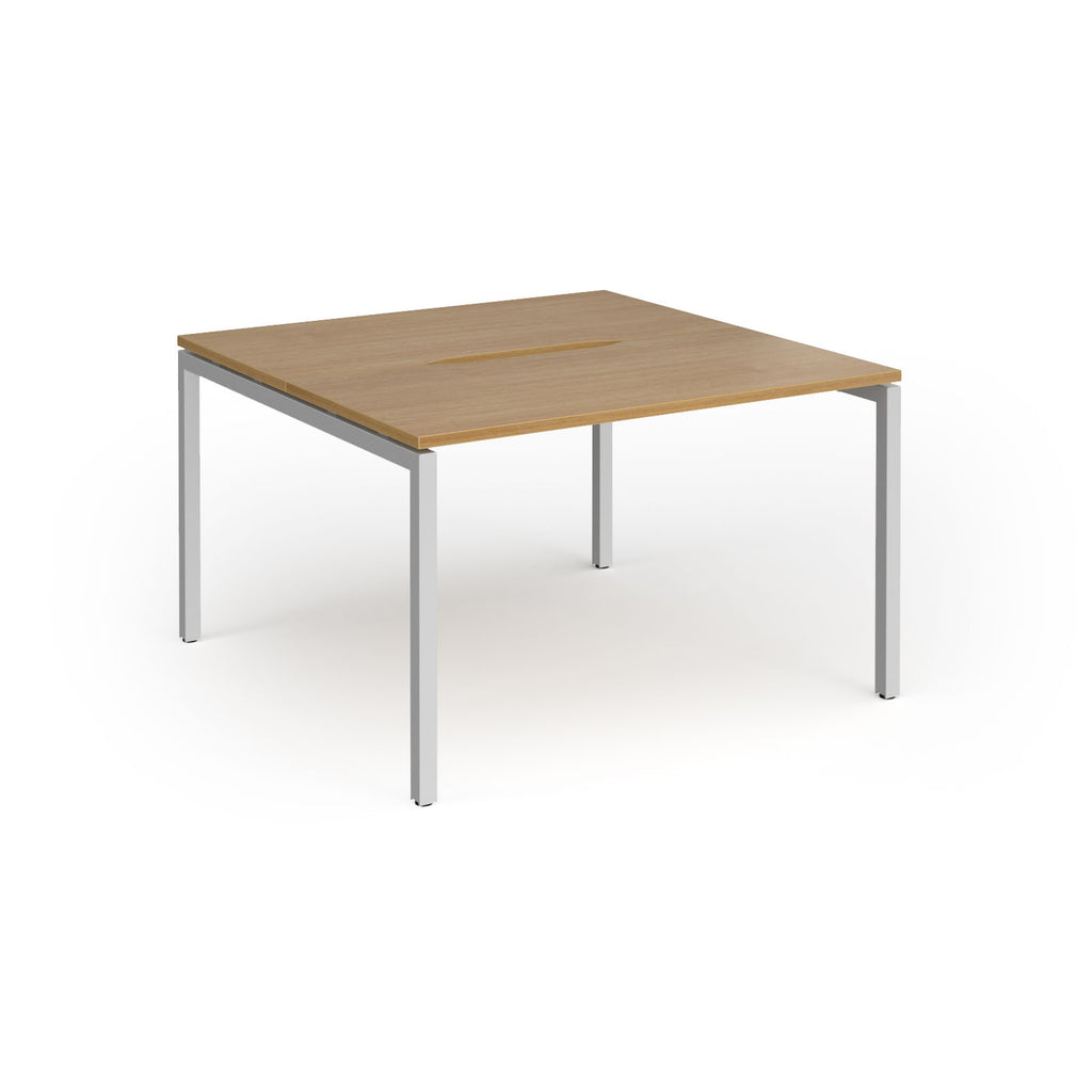 Back-to-back desk with wood-effect top and silver metal frame on a white background