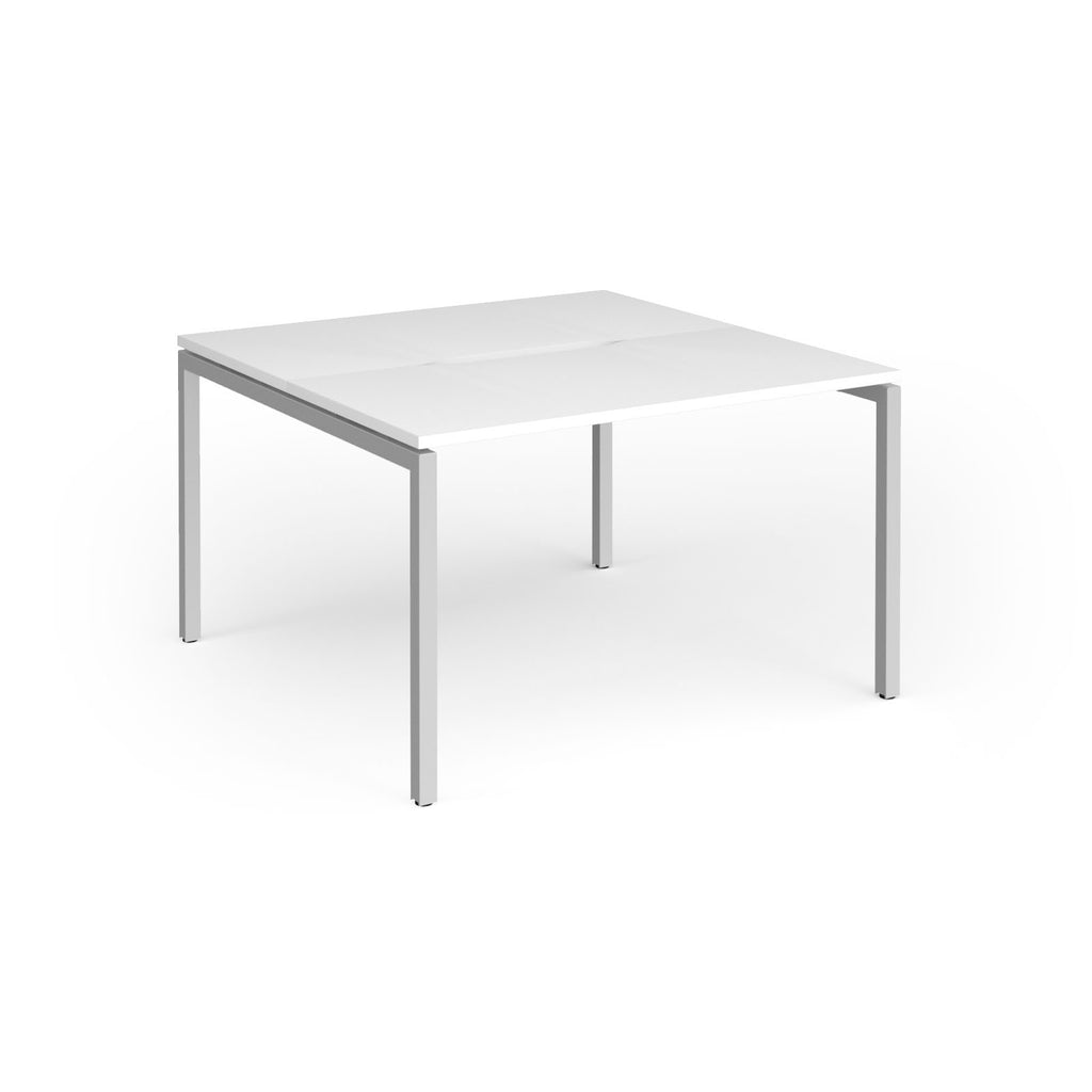 Back-to-back desk with white top and silver metal frame on a white background
