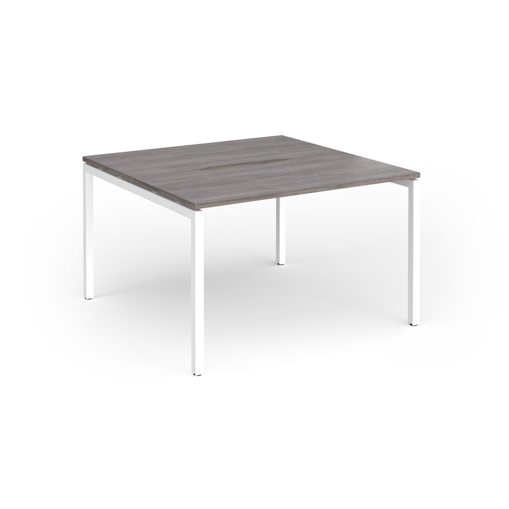 Back-to-back desk with grey wood-effect top and white metal frame on a white background