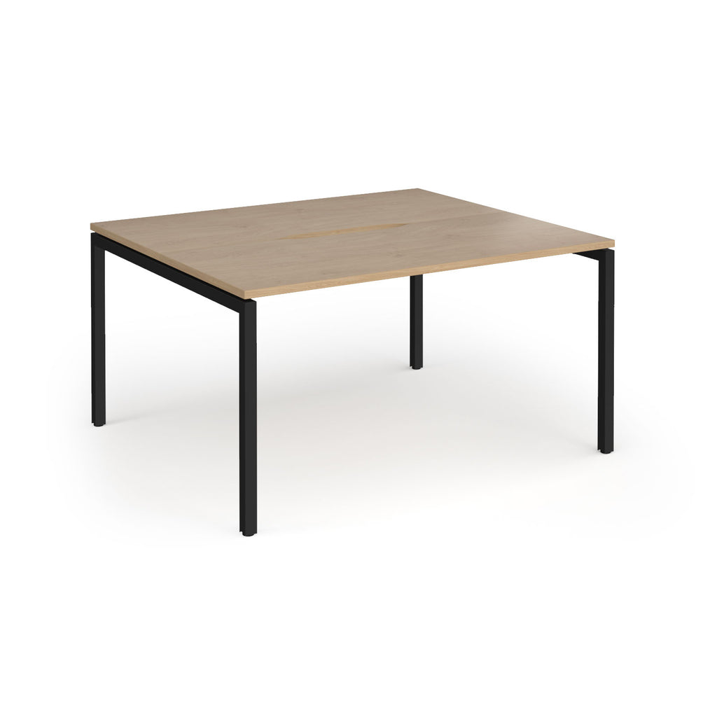 Back-to-back desk with wood-effect top and black metal frame on a white background