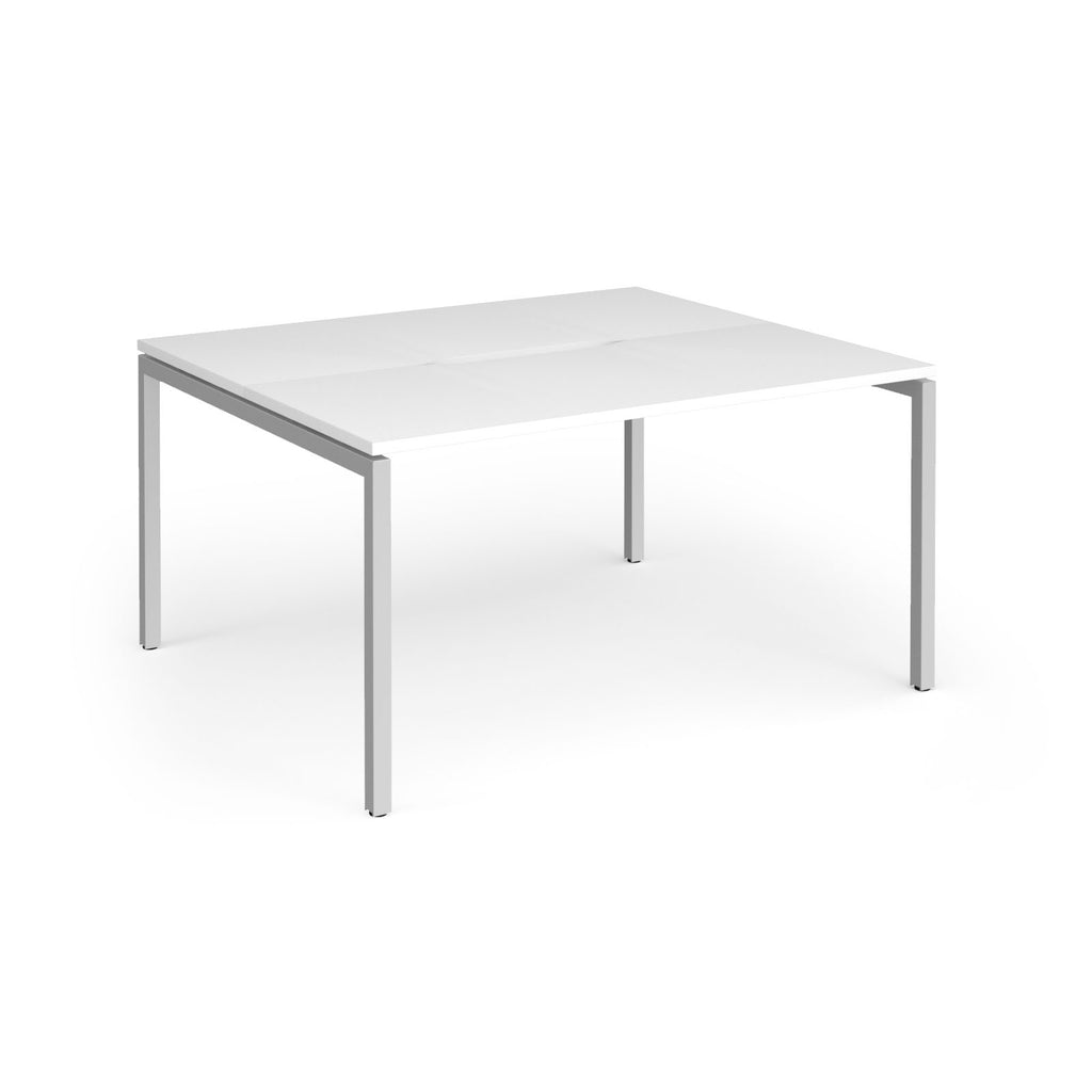 Back-to-back desk with white top and silver metal frame on a white background