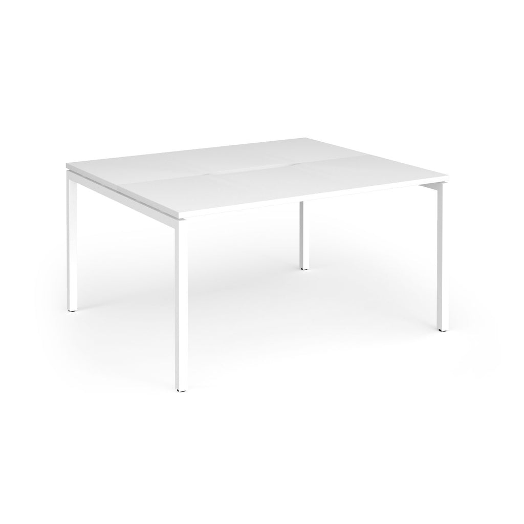 Back-to-back desk with white top and metal frame on a white background