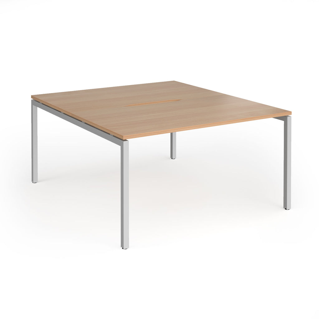 Office back-to-ack desk with wood-effect top and silver metal frame on a white background