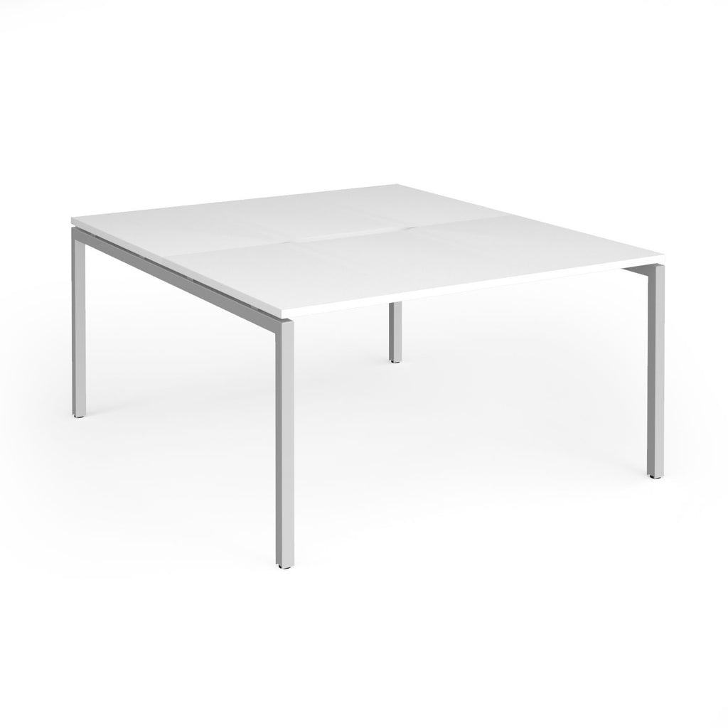 Office back-to-ack desk with white top and silver metal frame on a white background