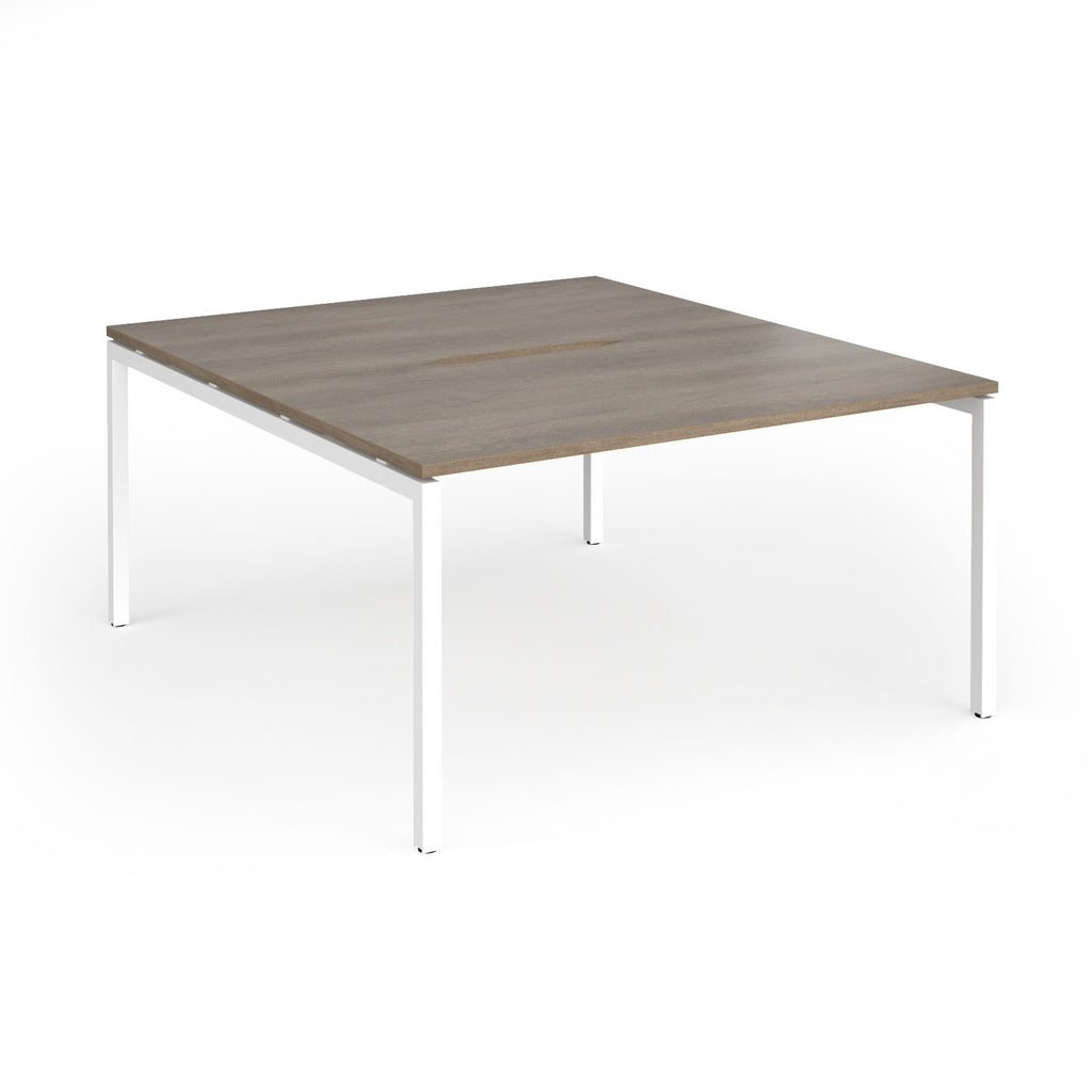 Office back-to-ack desk with wood-effect top and white metal frame on a white background
