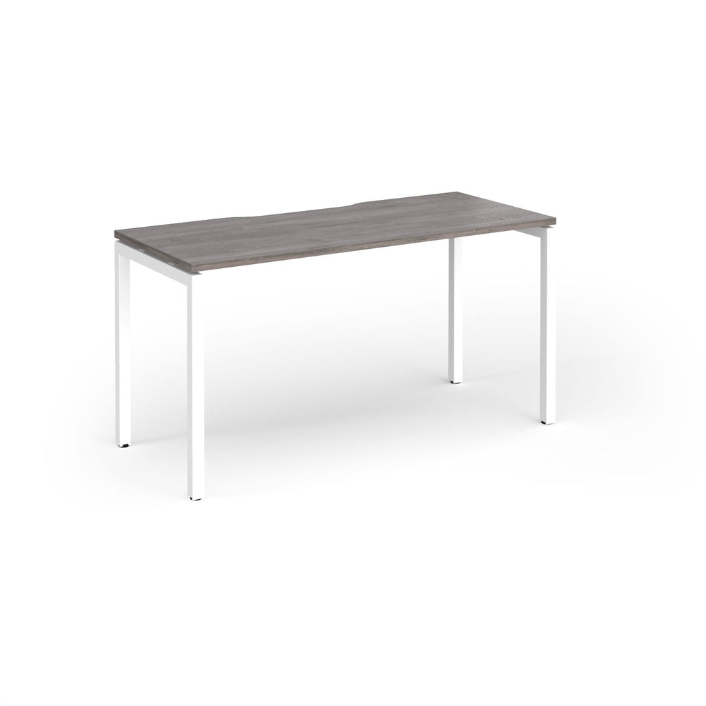 Rectangular desk with grey wood-effect top and white legs on a white background