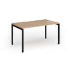 Rectangular desk with wood-effect top and black frame on a white background