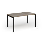 Rectangular desk with wood-effect top and black frame on a white background