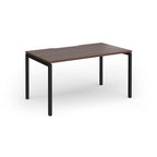 Rectangular desk with wood-effect top and black frame on a white background