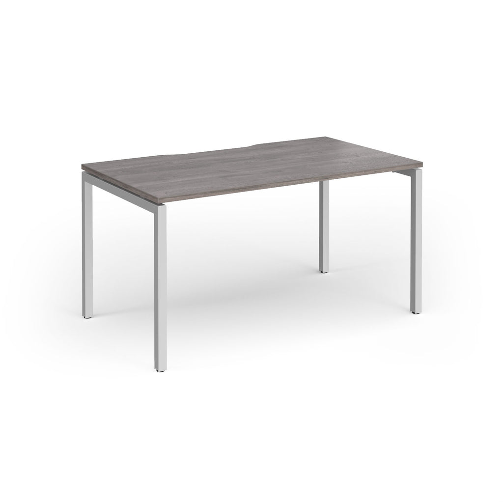 Rectangular desk with grey wood-effect top and silver frame on a white background