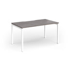 Rectangular desk with grey wood-effect top and white frame on a white background