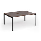 Back-to-back desk with wood-effect top and black metal frame on a white background