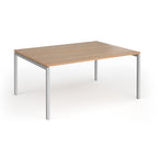 Back-to-back desk with wood-effect top and silver metal frame on a white background