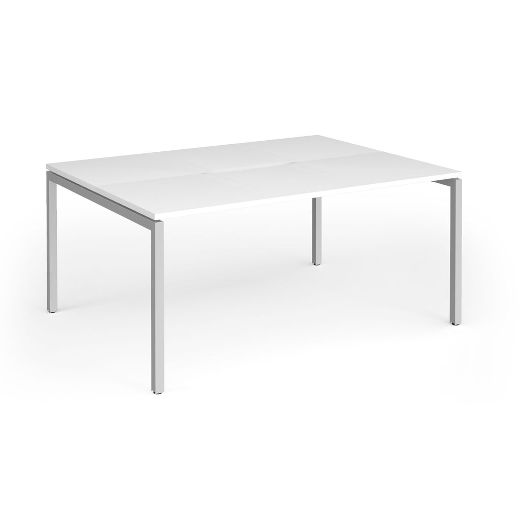 Back-to-back desk with white top and silver metal frame on a white background