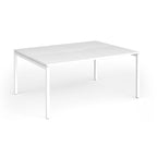 Back-to-back desk with white top and metal frame on a white background