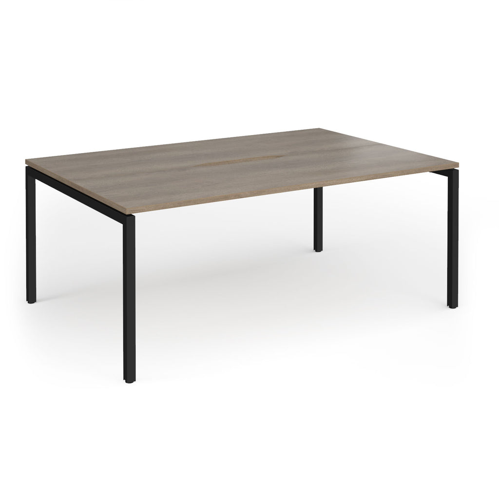 Back-to-back desk with wood-effect top and black metal frame on a white background