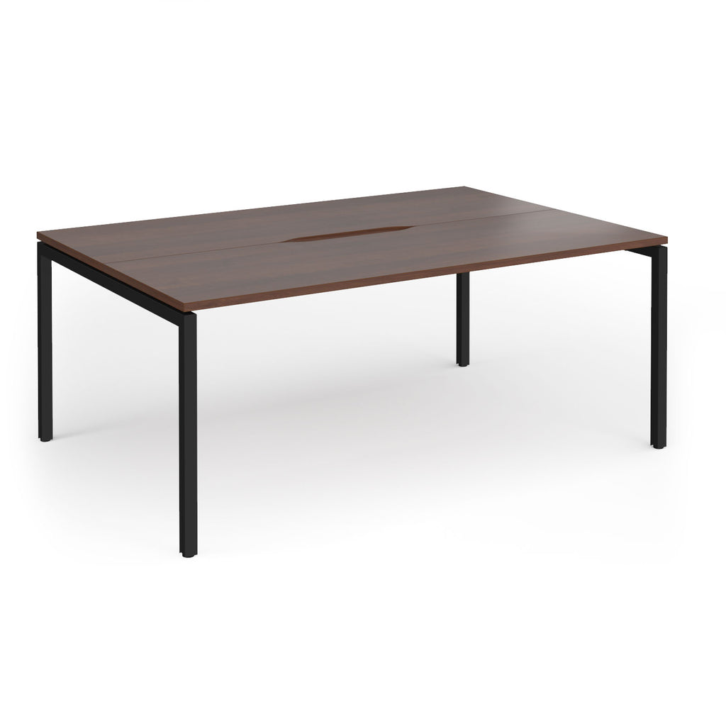 Back-to-back desk with wood-effect top and black metal frame on a white background