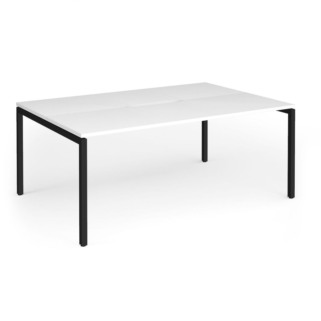 Back-to-back desk with white top and black metal frame on a white background