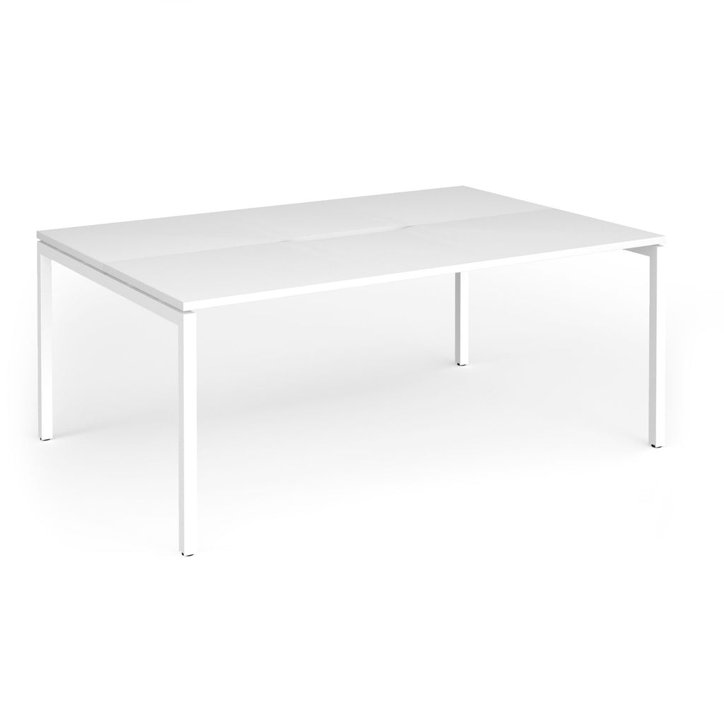 Back-to-back desk with white top and metal frame on a white background