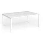 Back-to-back desk with white top and metal frame on a white background