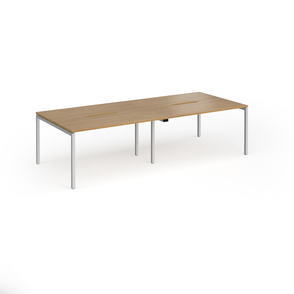 Office bench desks with wood-effect top and silver legs on a white background