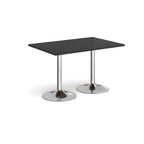A modern rectangular table with a black top and two slim chrome pedestal bases with round flared feet, shown on a plain white background.