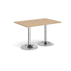A rectangular table with a light wood-effect top and two polished chrome pedestal legs, shown on a plain white background.