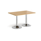 A rectangular table with a light wood-effect top and two polished chrome pedestal legs, shown on a plain white background.