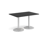A modern rectangular table with a black top and two silver pedestal bases, shown on a plain white background.