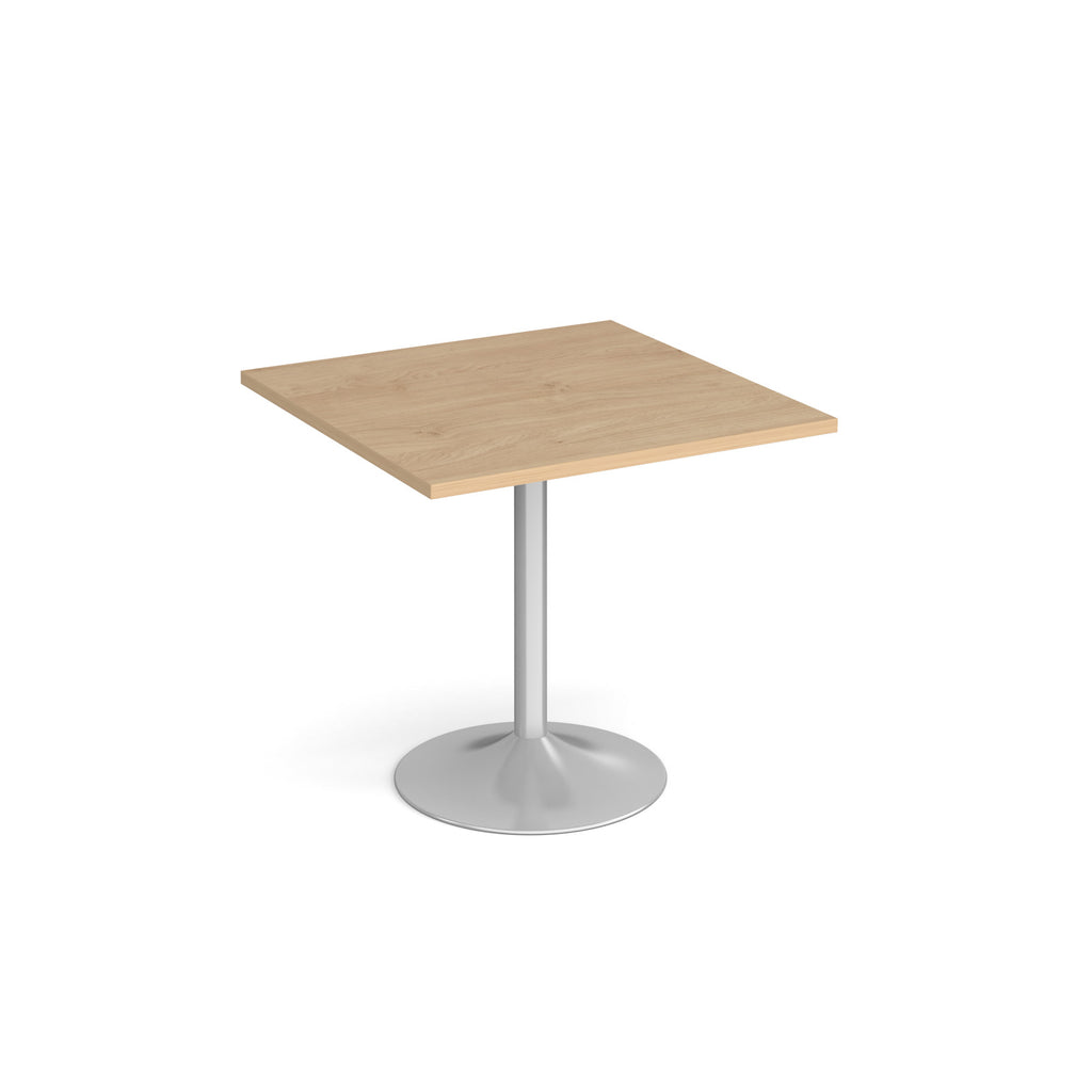 A modern square dining table with a wood-effect top and a silver pedestal base, shown on a plain white background.