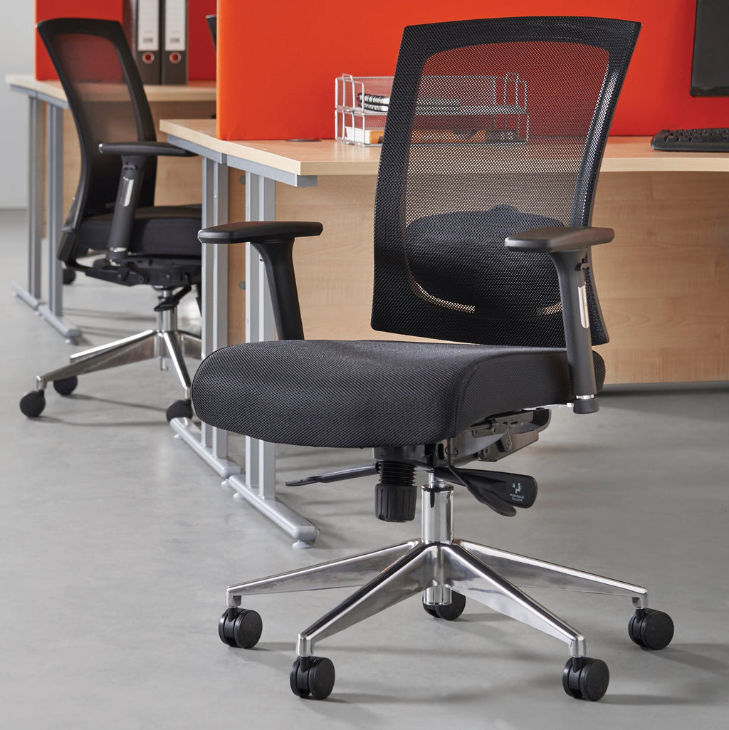 Black office chair with wheels in an office setting