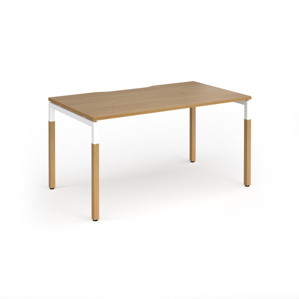 Straight desk with light oak wood grain top and legs with white frame on a white background