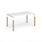 Straight desk with white top and wooden legs on a white background