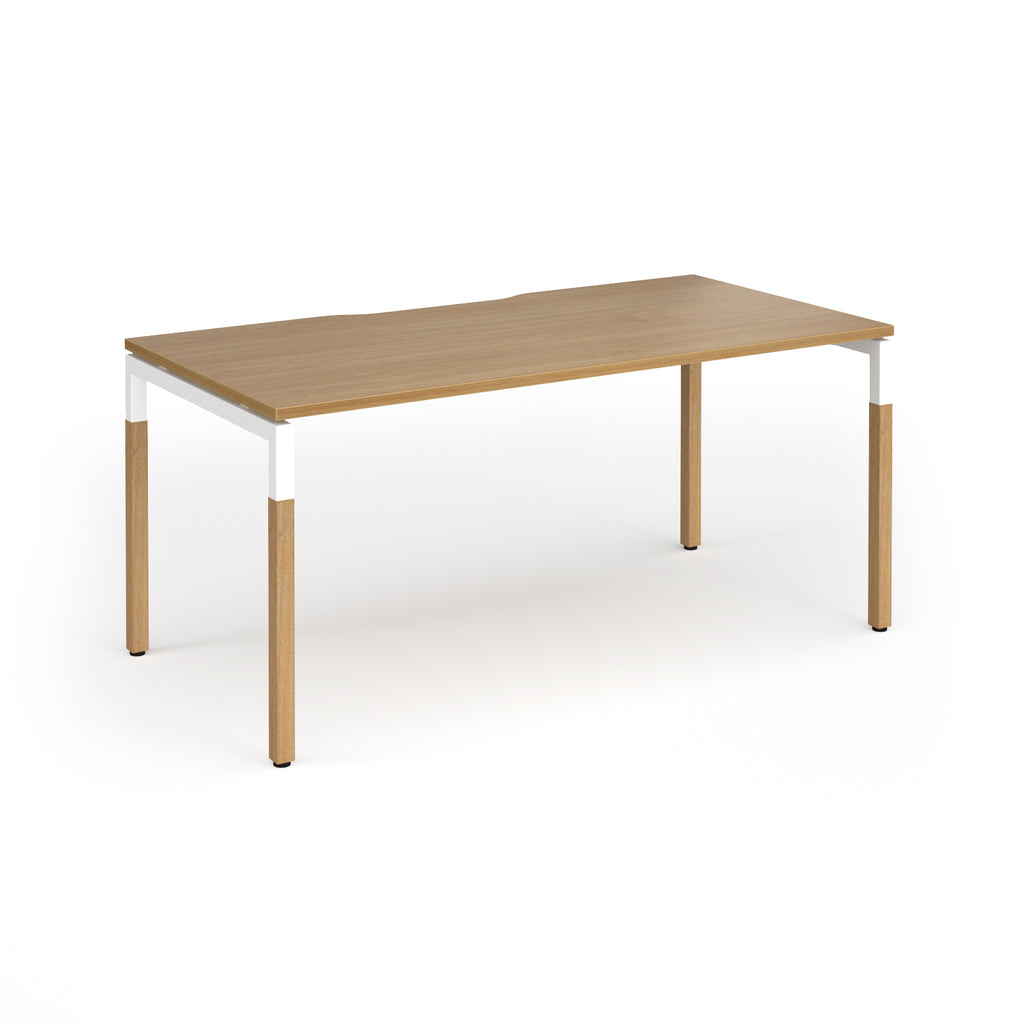 Straight desk with light oak wood grain top and legs with white frame on a white background