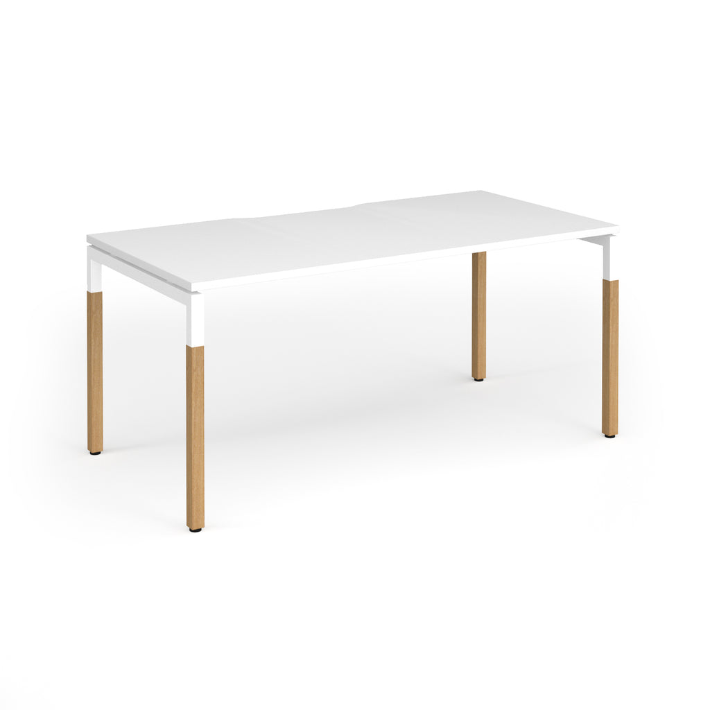 Straight desk with white top and wooden legs on a white background