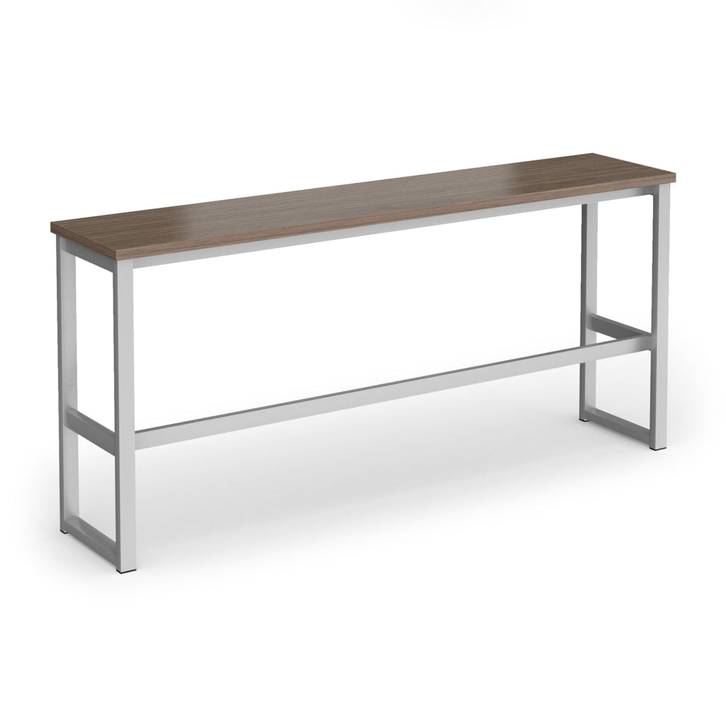 A modern high table with a medium brown wood-look top and a silver metal frame, shown on a plain white background.