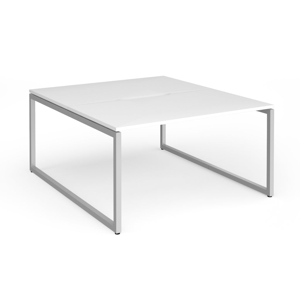 Back-to-back desk with white top and silver metal legs on a white background