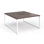 Back-to-back desk with wood-effect top and white metal legs on a white background