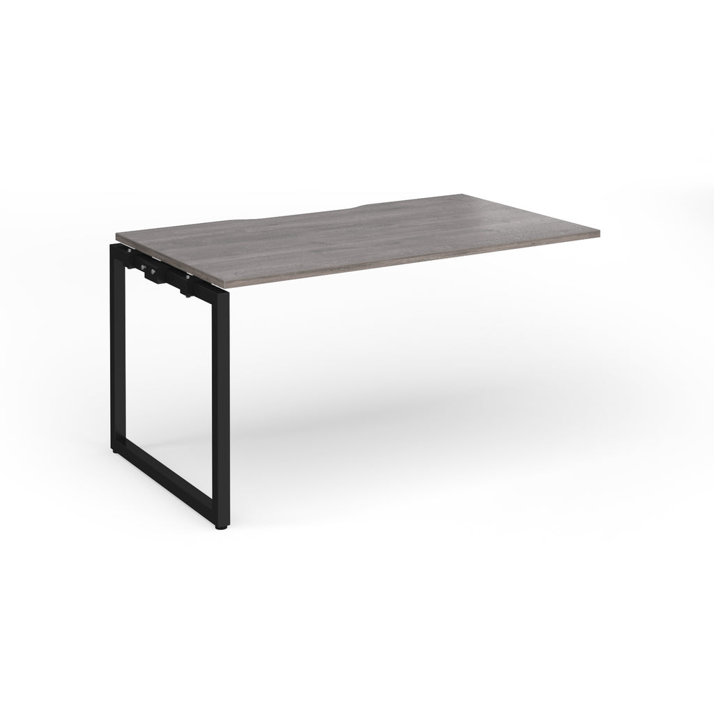 Desk add-on with grey wood-effect top and black metal frame on a white background