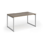 Rectangular desk with wood-effect top and silver metal legs on a white background