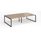 Back-to-back bench desk with wood-effect top and black metal legs on a white background