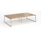 Back-to-back bench desk with wood-effect top and silver metal legs on a white background