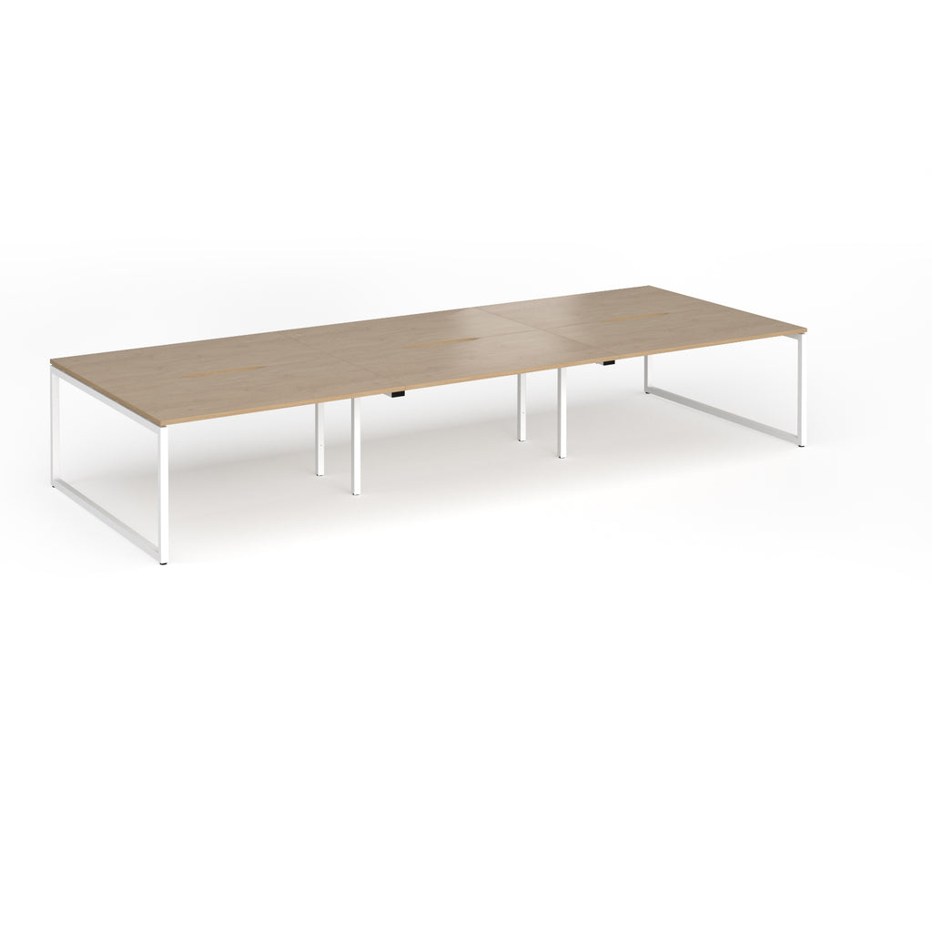 Long back-to-back desk with wood-effect top and white metal legs on a white background