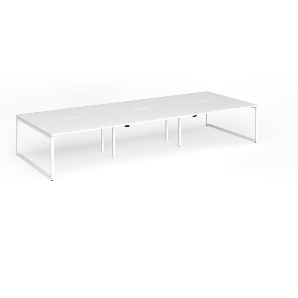 Long back-to-back desk with white top and metal legs on a white background