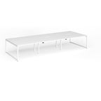 Long back-to-back desk with white top and metal legs on a white background