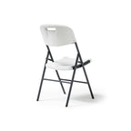 White folding chair with black legs on a white background