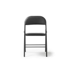 A black folding chair with a padded seat and curved backrest, shown from the front on a clean white background.