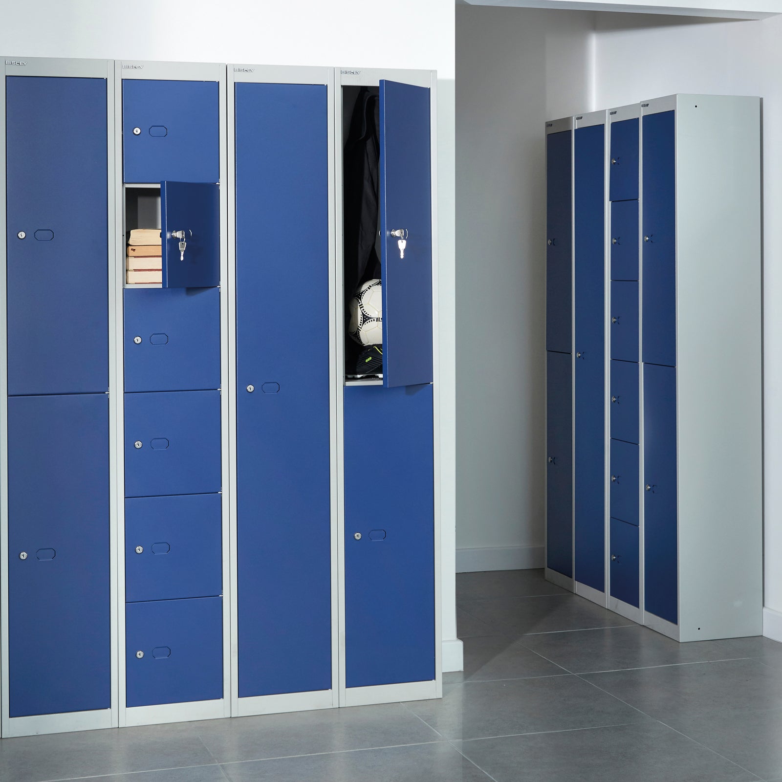 Blue lockers with grey frames in a room setting