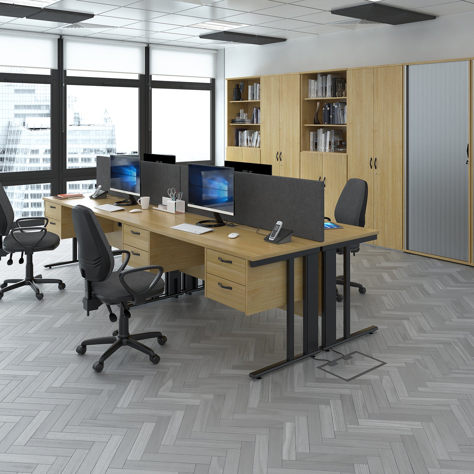 Modern office setup with desks, chairs, and bookshelves.